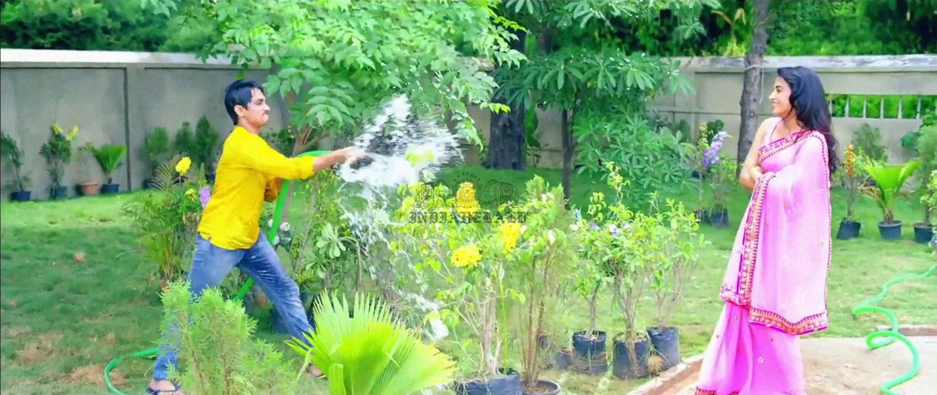 Hottest Photos of Trisha getting Wet and stripping her Saree Set 1