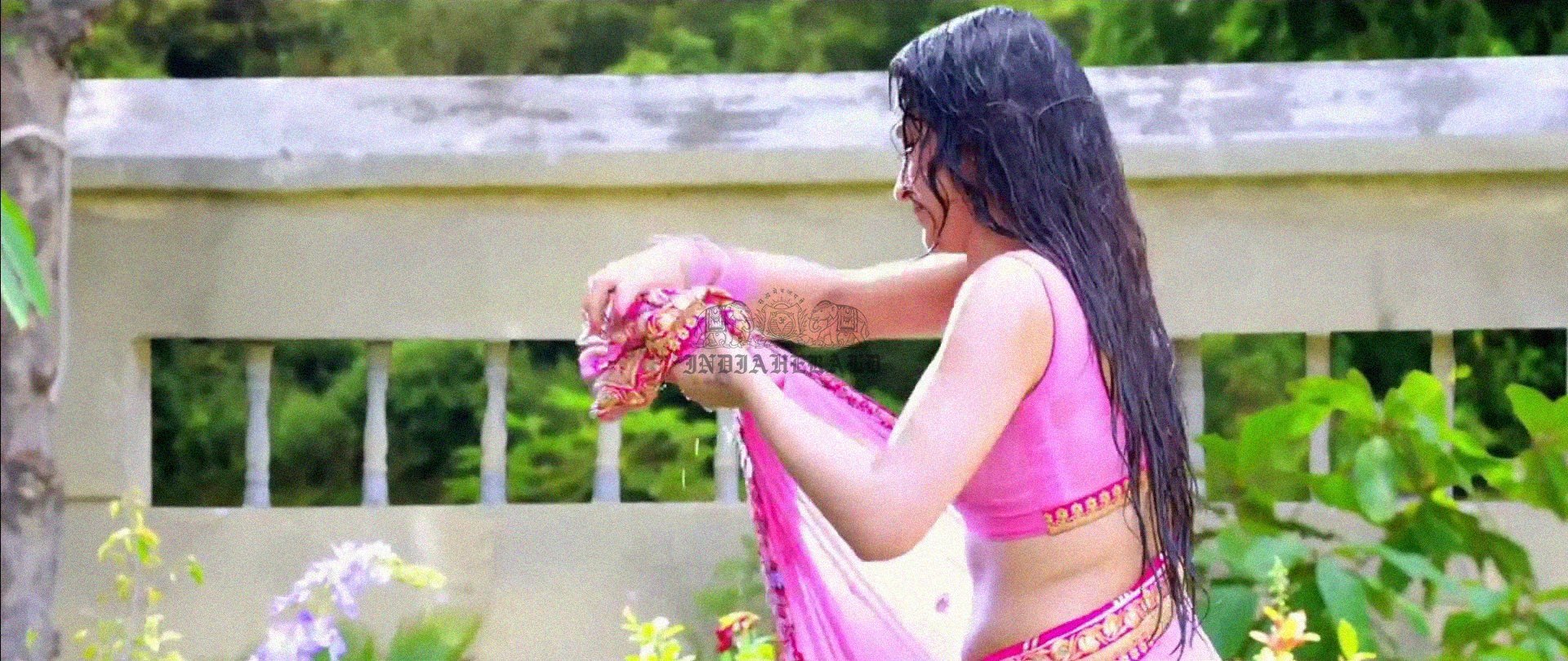 Hottest Photos of Trisha Getting Wet and Stripping Her Saree Set 3