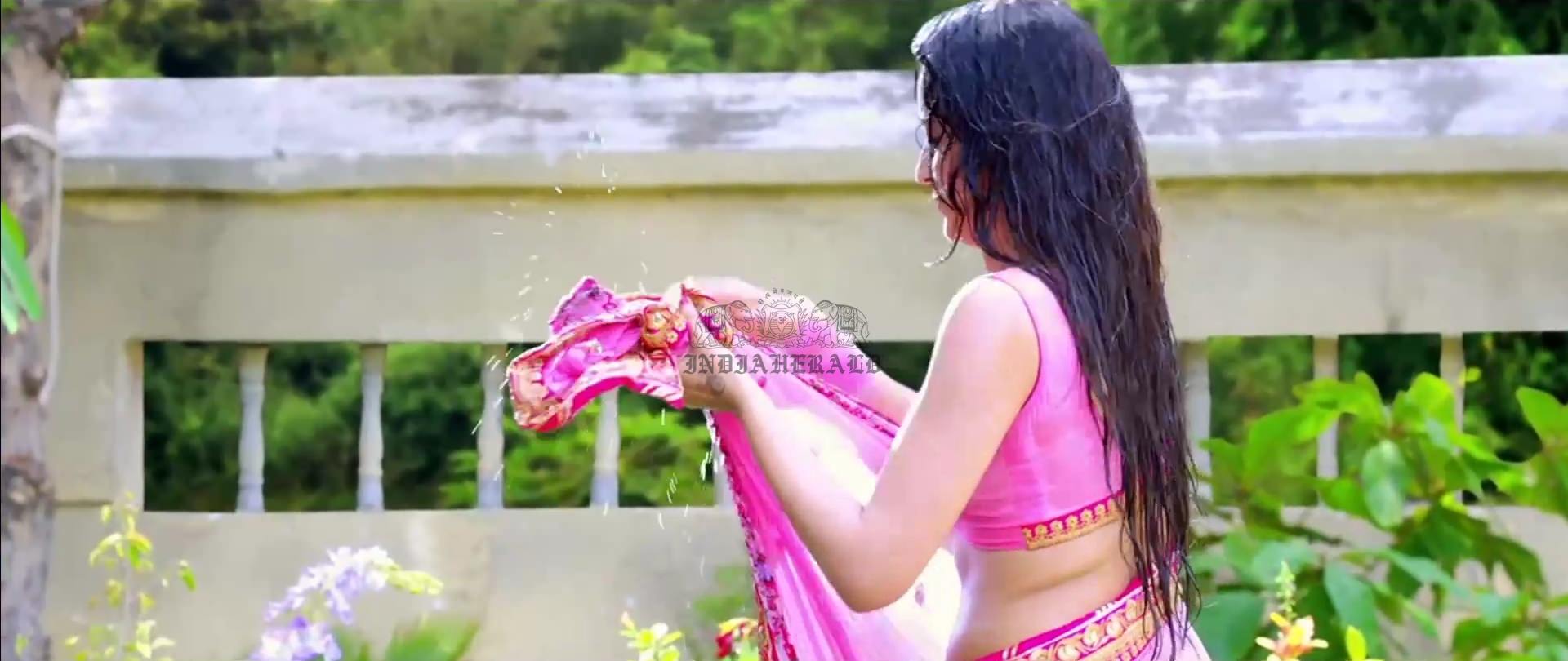 Hottest Photos of Trisha Getting Wet and Stripping Her Saree Set 3