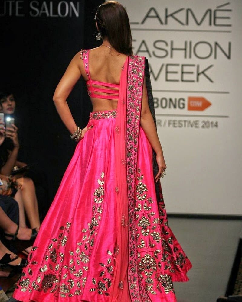 Ileana Walks The Ramp In A Waist Revealing Dress