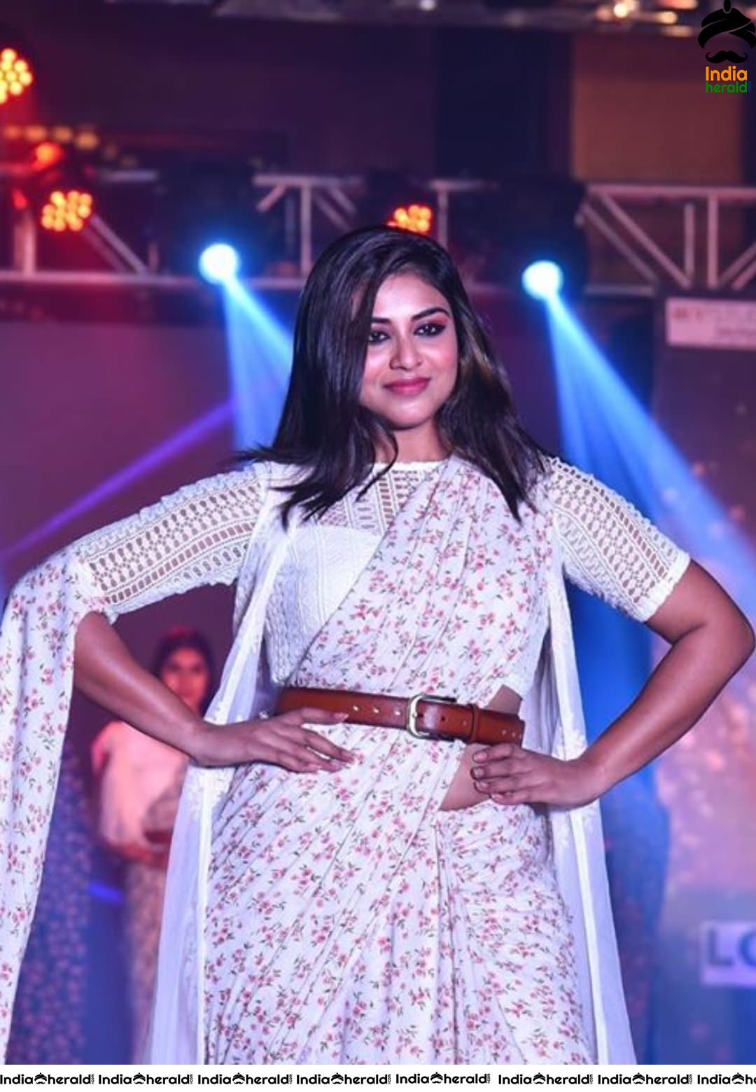 Indhuja latest photos in White Saree at a Fashion Show