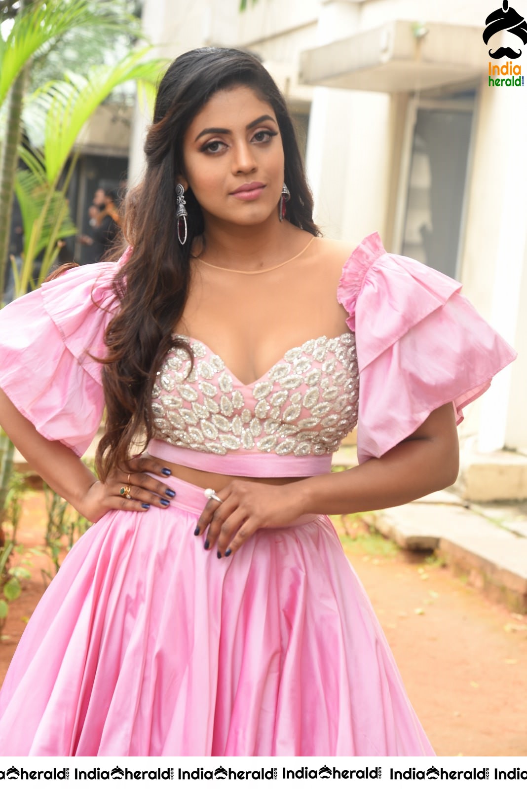 Iniya Latest Hot Photos in Pink flaunting her back Set 2