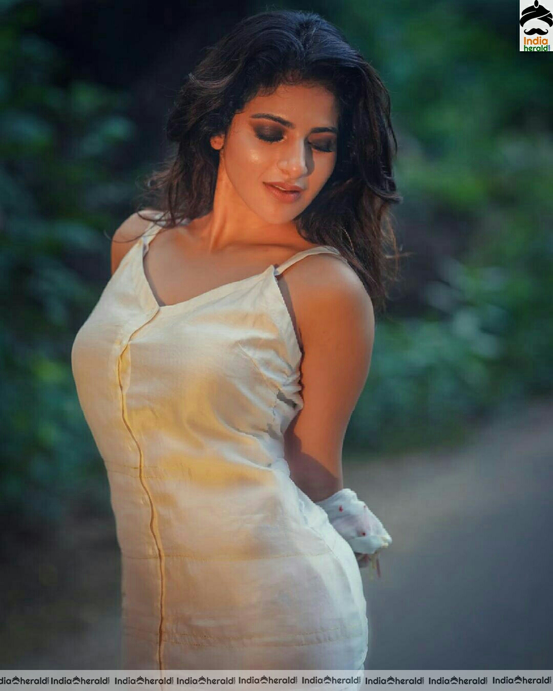 Iswarya Menon Latest Cute White Dress Stills