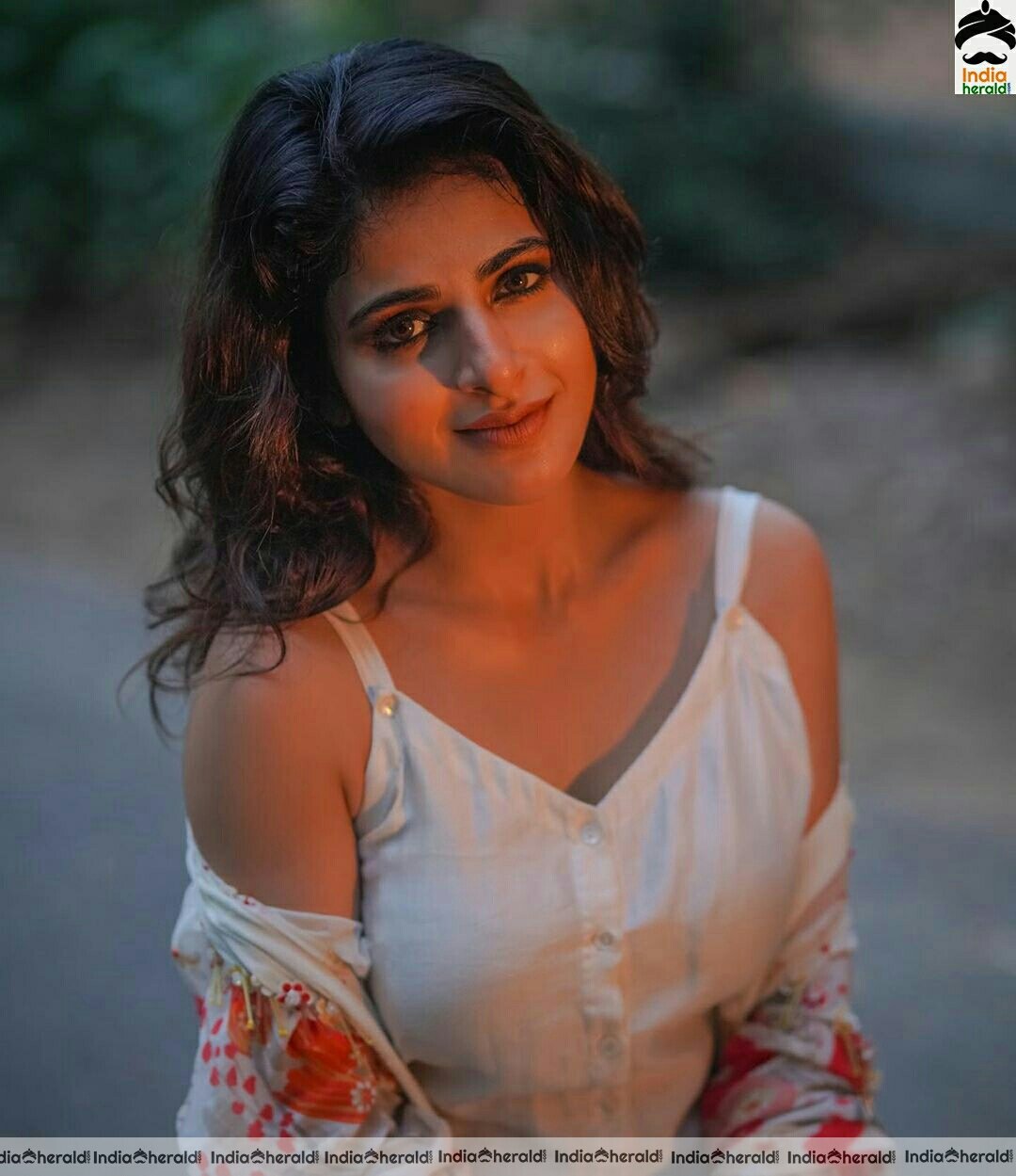 Iswarya Menon Latest Cute White Dress Stills