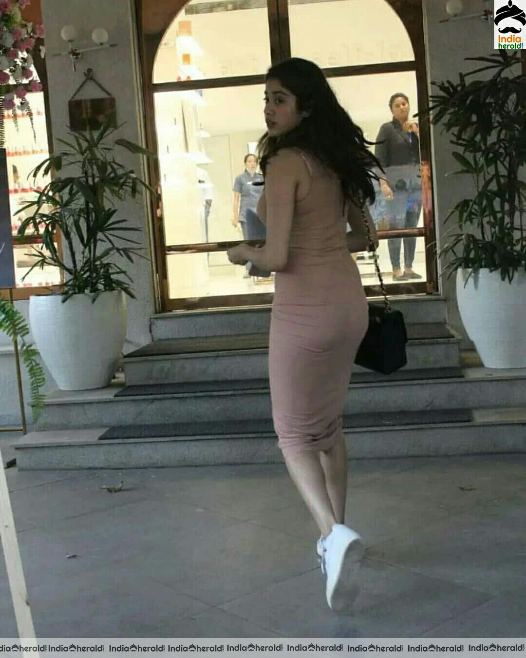 Jahnvi shows her hot assets in tight dress