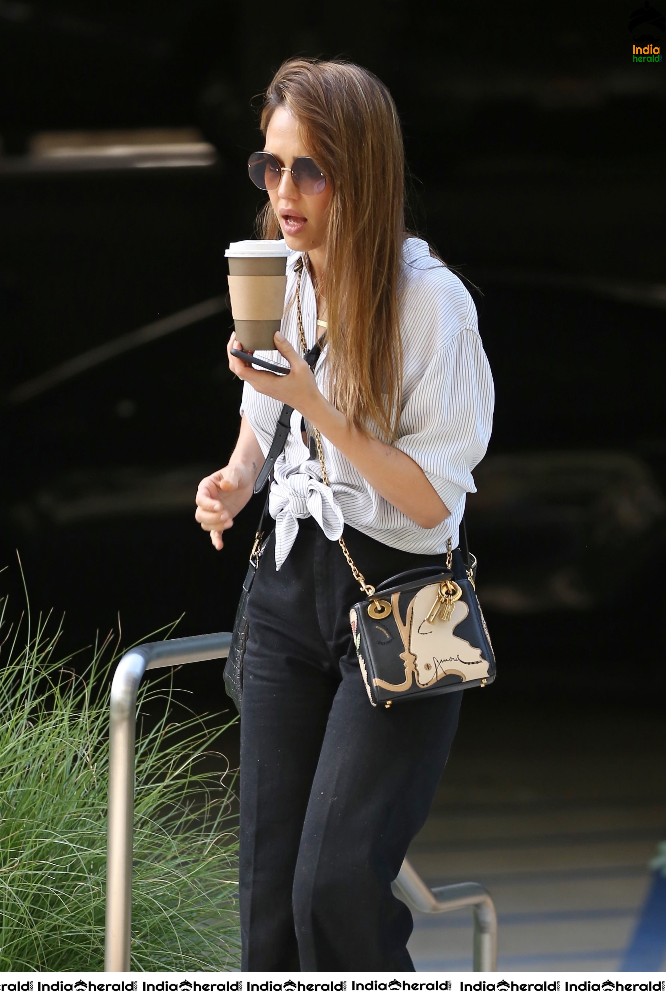 Jessica Alba Out in Santa Monica holding a Coffee Cup Set 1
