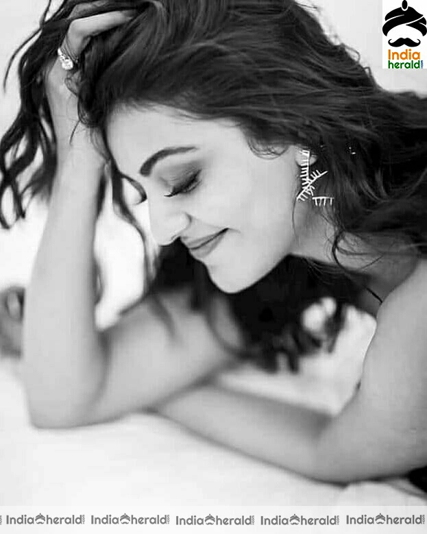 [Image: kajal-aggarwal-cute-black-and-white-photoshoot7.jpg]