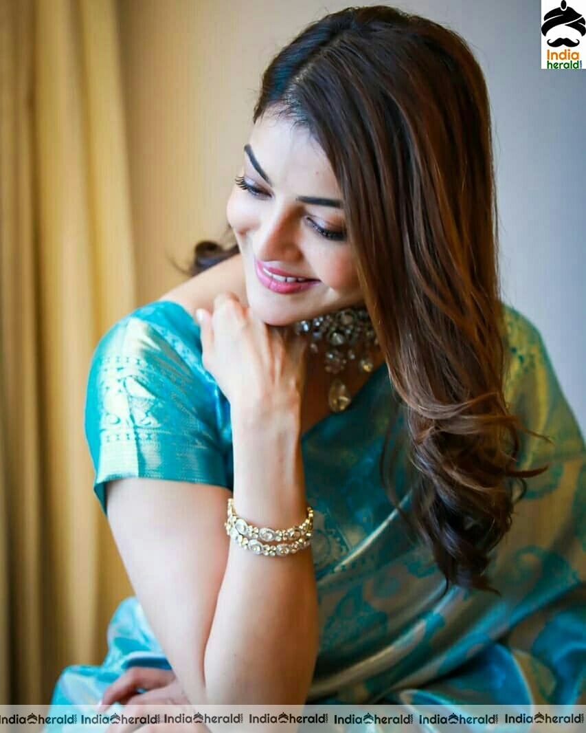 Kajal Aggarwal Cute Blue Saree Stills