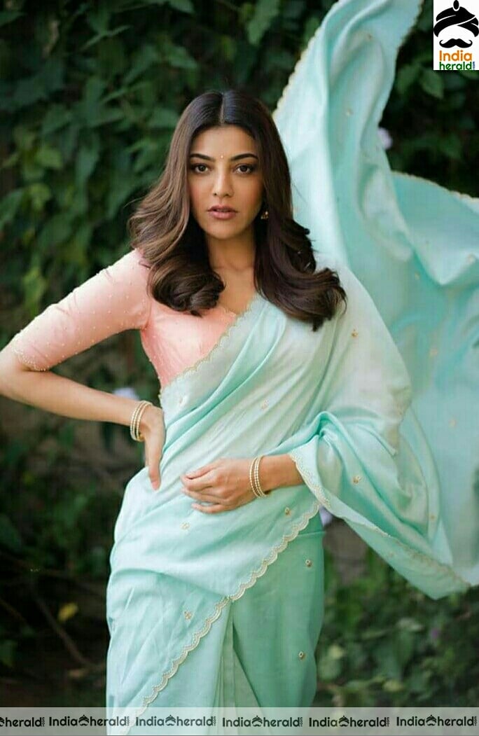 Kajal Aggarwal Cute Blue Saree Stills