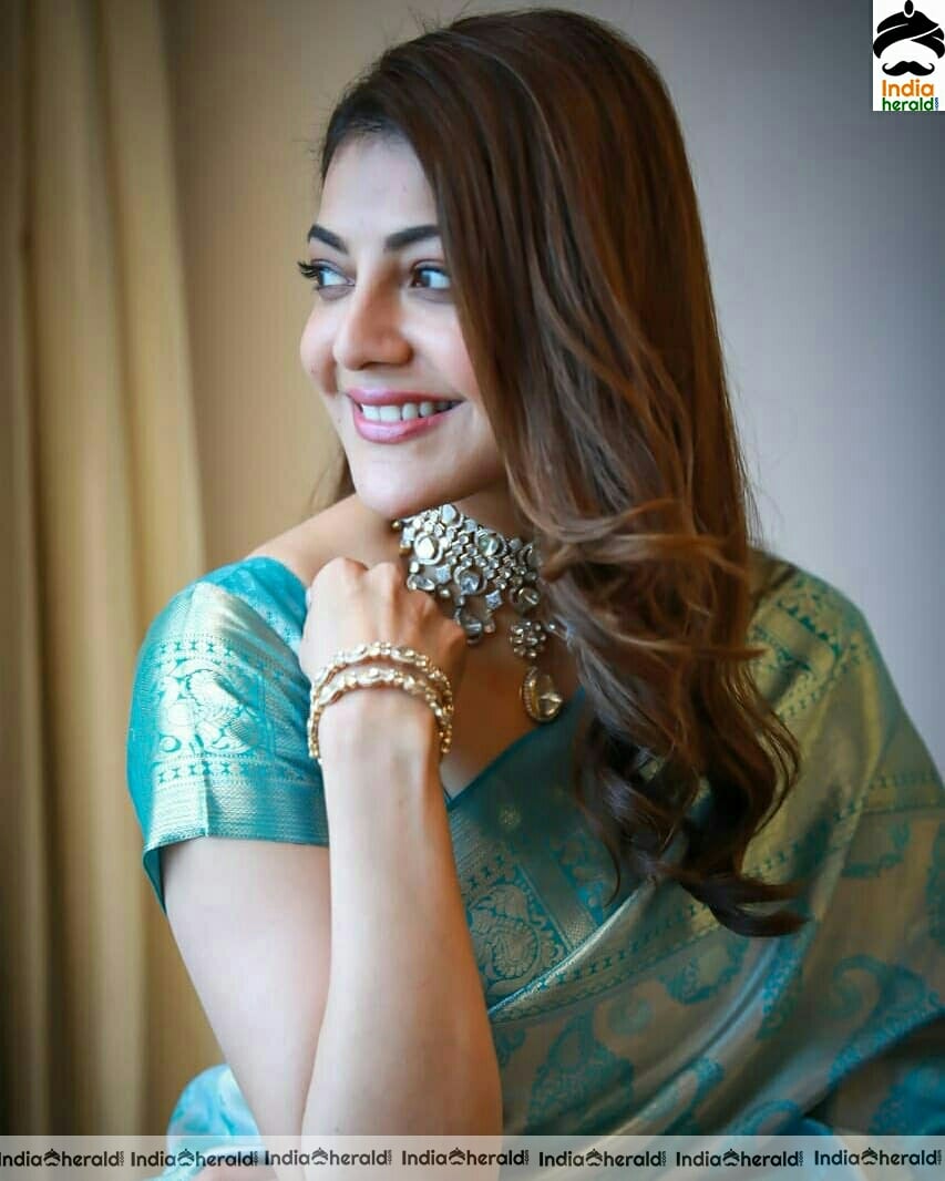 Kajal Aggarwal Cute Blue Saree Stills