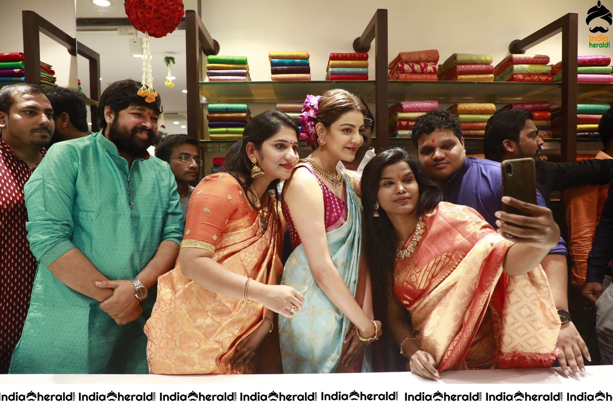 Kajal Aggarwal Hot Hip and Navel Show in Saree at the Launch of Vidhatri Shopping Mall Set 1