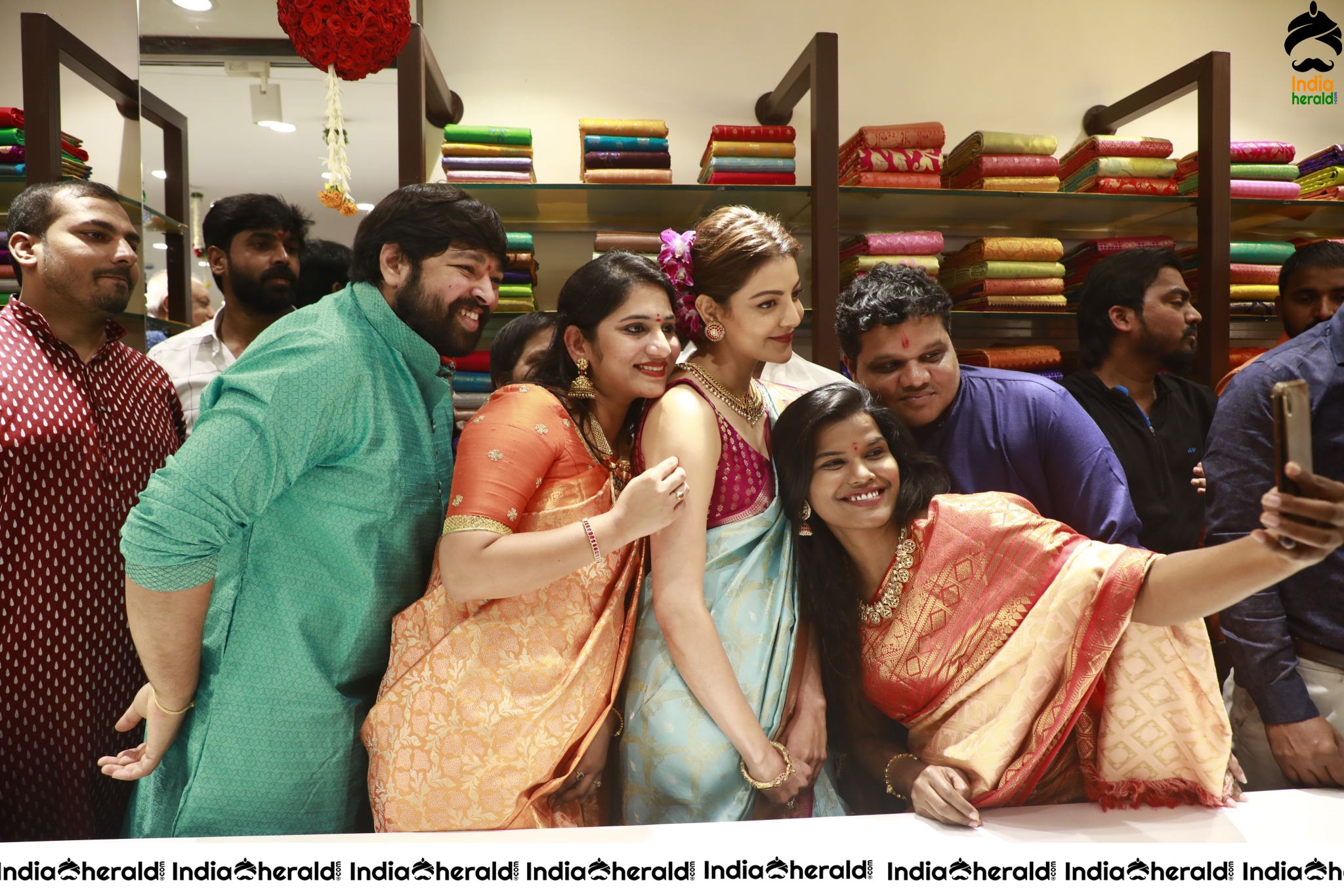 Kajal Aggarwal Hot Hip and Navel Show in Saree at the Launch of Vidhatri Shopping Mall Set 1