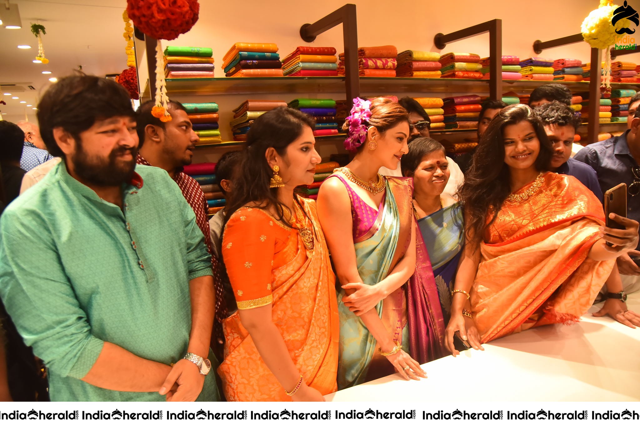 Kajal Aggarwal Hot Hip and Navel Show in Saree at the Launch of Vidhatri Shopping Mall Set 4