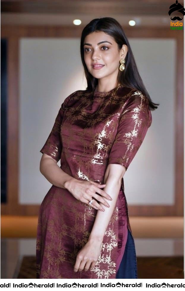 Kajal Aggarwal Hot Photos shot inside Hotel Room exposing her Waistline
