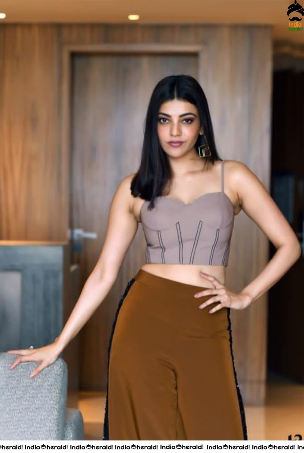 Kajal Aggarwal Hot Photos shot inside Hotel Room exposing her Waistline