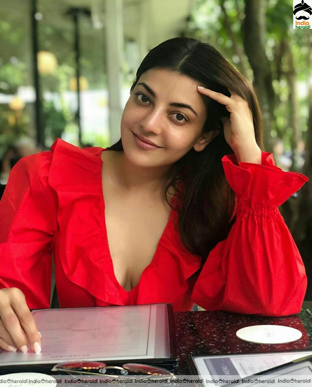 Kajal Aggarwal Latest Hot Cleavage Revealing In Red Frock Stills