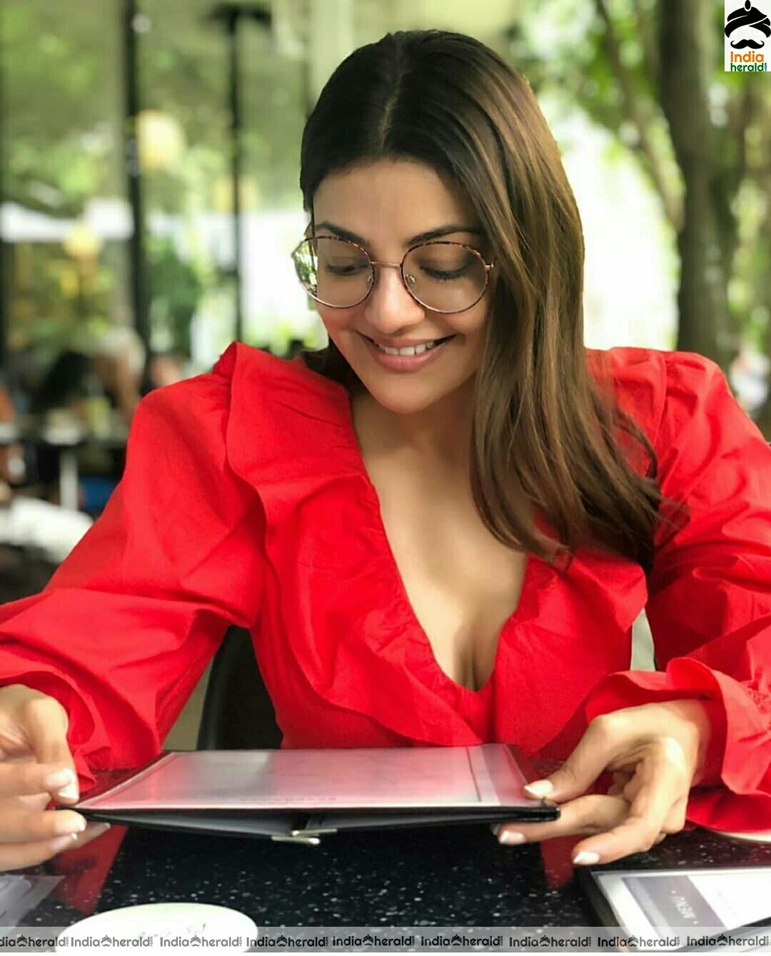 Kajal Aggarwal Latest Hot Cleavage Revealing In Red Frock Stills