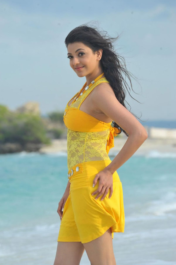 Kajal Aggarwal Shows Her Sexiness To Next Level In Yellow Hot Attire