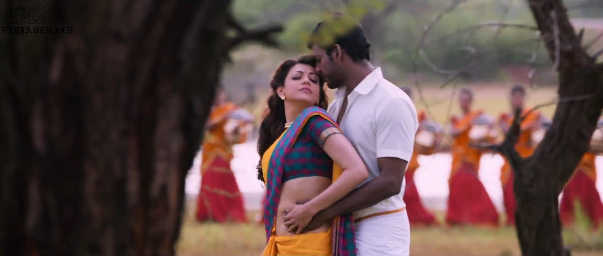 Kajal Aggarwal waist squeezed and Navel pressed by Hero Hot photos Set 1