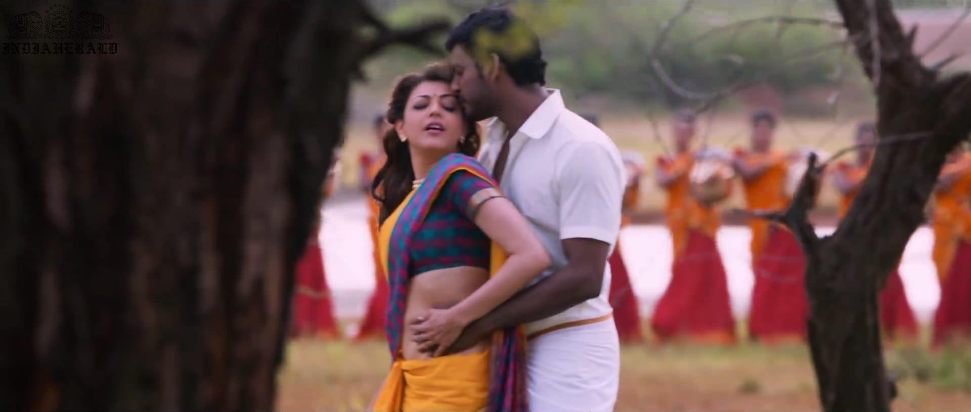 Kajal Aggarwal waist squeezed and Navel pressed by Hero Hot photos Set 1