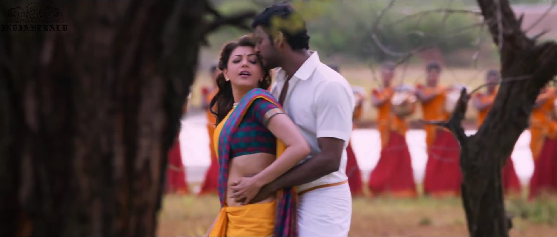 Kajal Aggarwal waist squeezed and Navel pressed by Hero Hot photos Set 1
