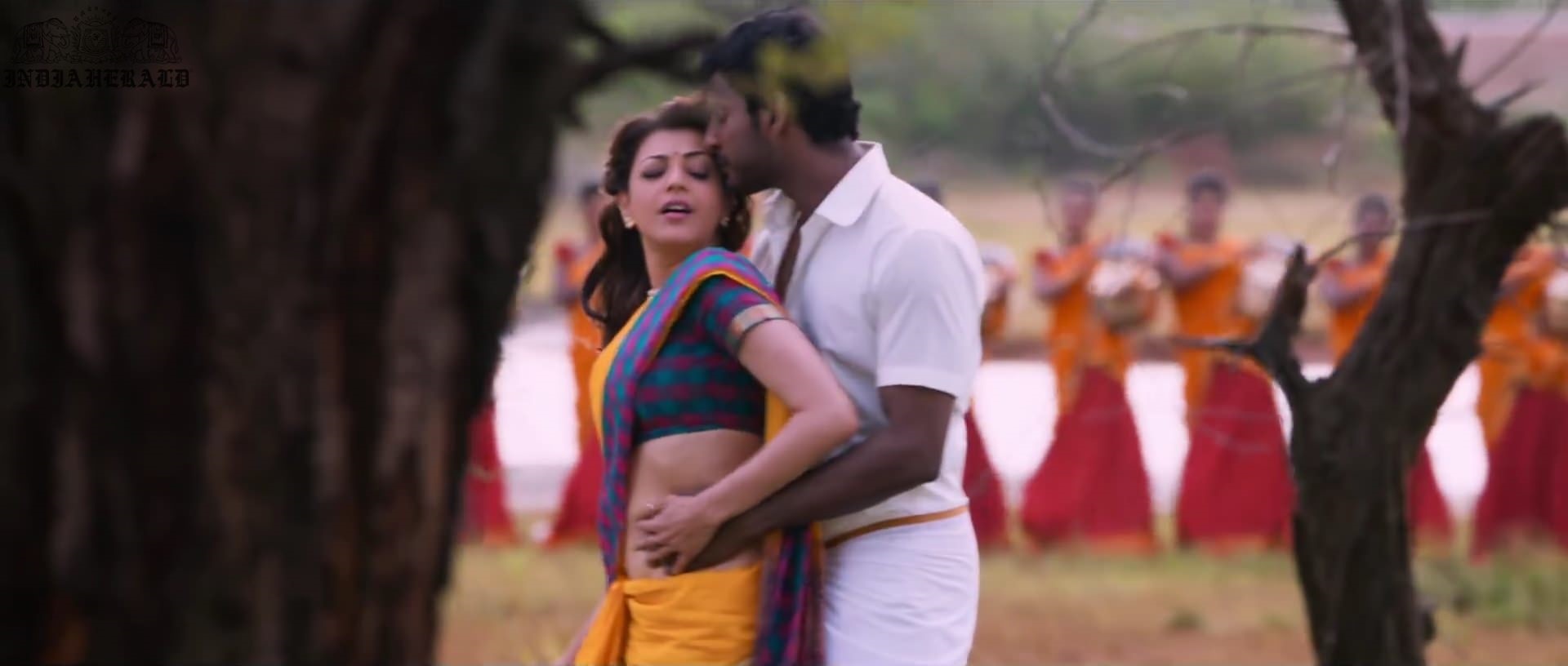 Kajal Aggarwal waist squeezed and Navel pressed by Hero Hot photos Set 1