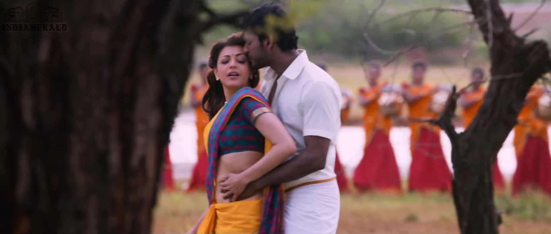 Kajal Aggarwal waist squeezed and Navel pressed by Hero Hot photos Set 1