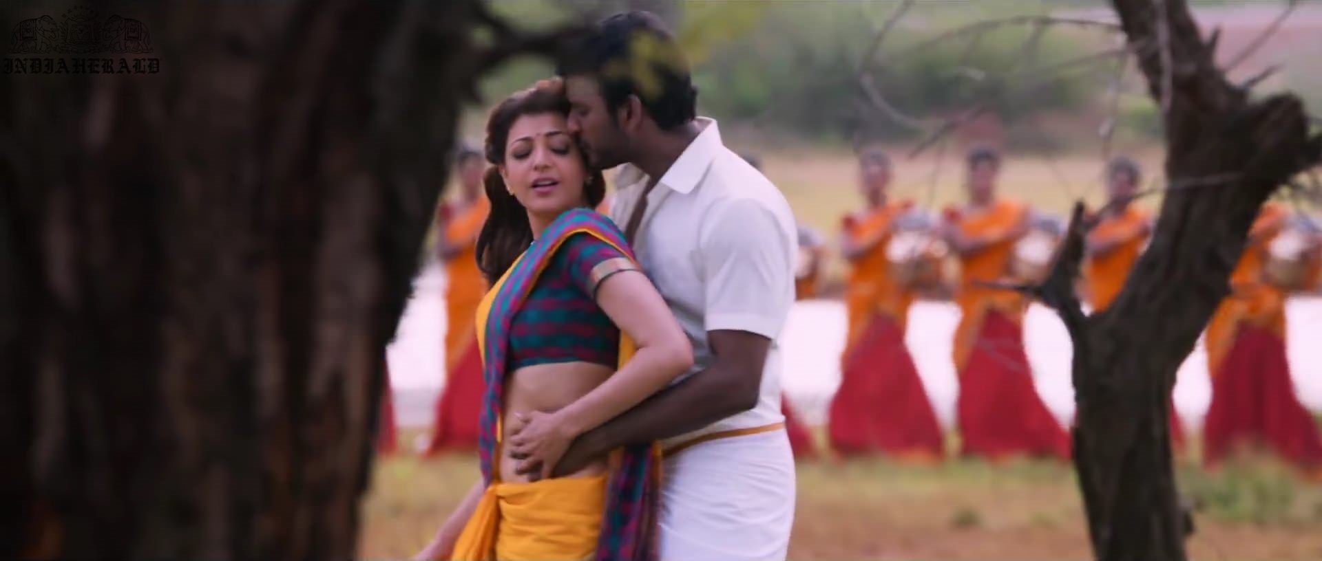 Kajal Aggarwal waist squeezed and Navel pressed by Hero Hot photos Set 1