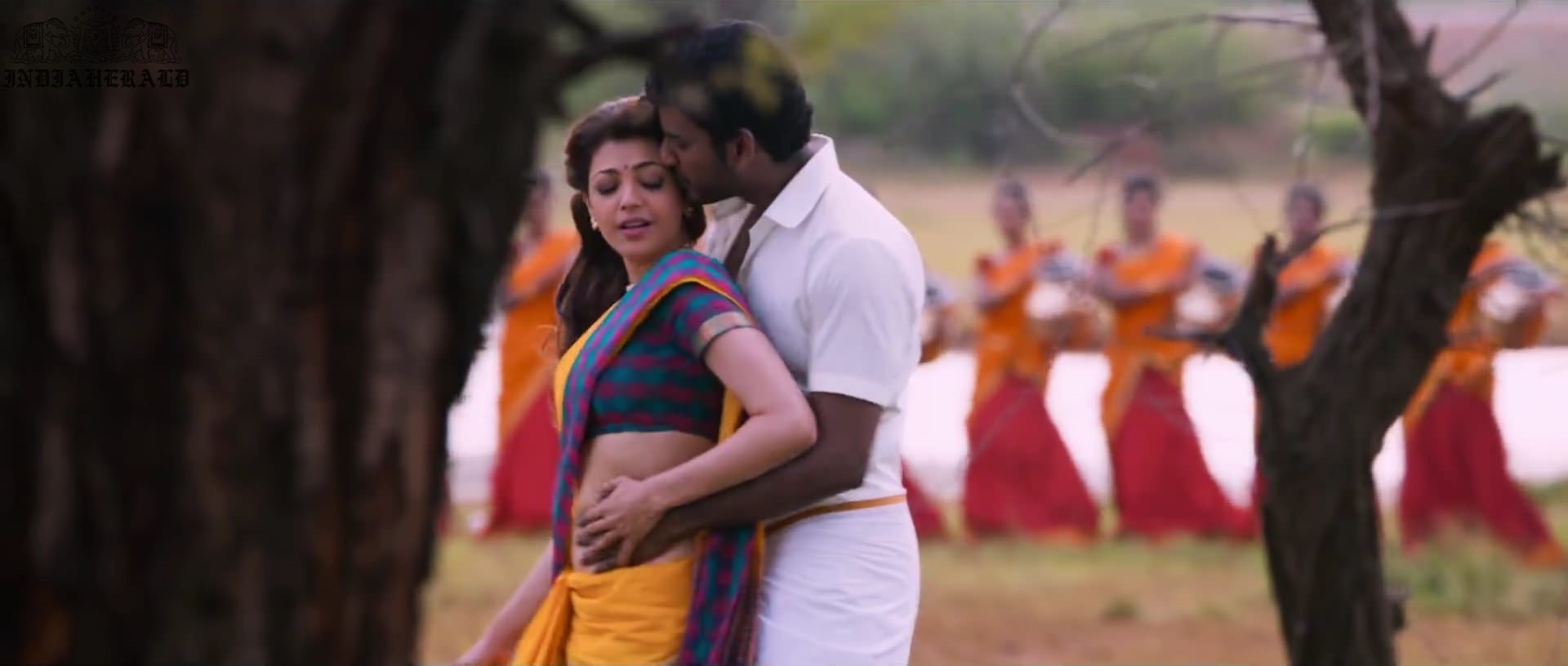 Kajal Aggarwal waist squeezed and Navel pressed by Hero Hot photos Set 1