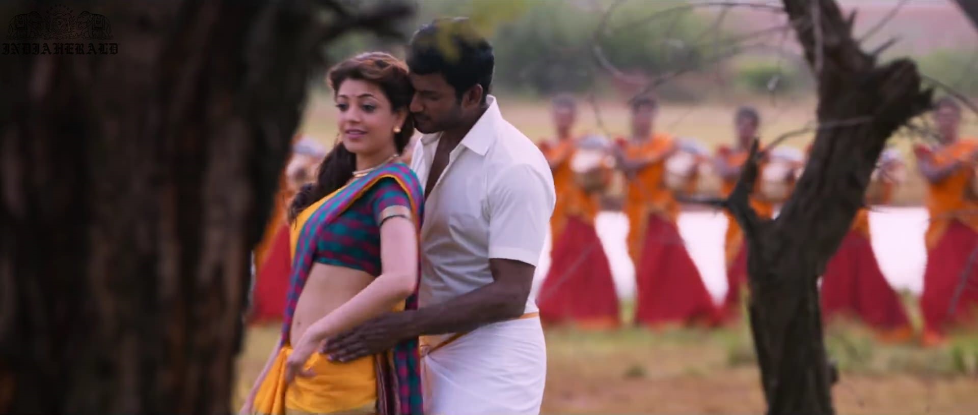 Kajal Aggarwal waist squeezed and Navel pressed by Hero Hot photos Set 1