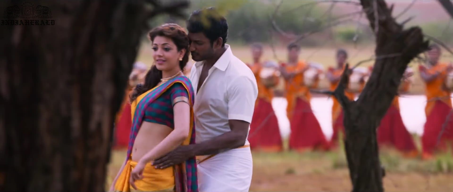 Kajal Aggarwal waist squeezed and Navel pressed by Hero Hot photos Set 1