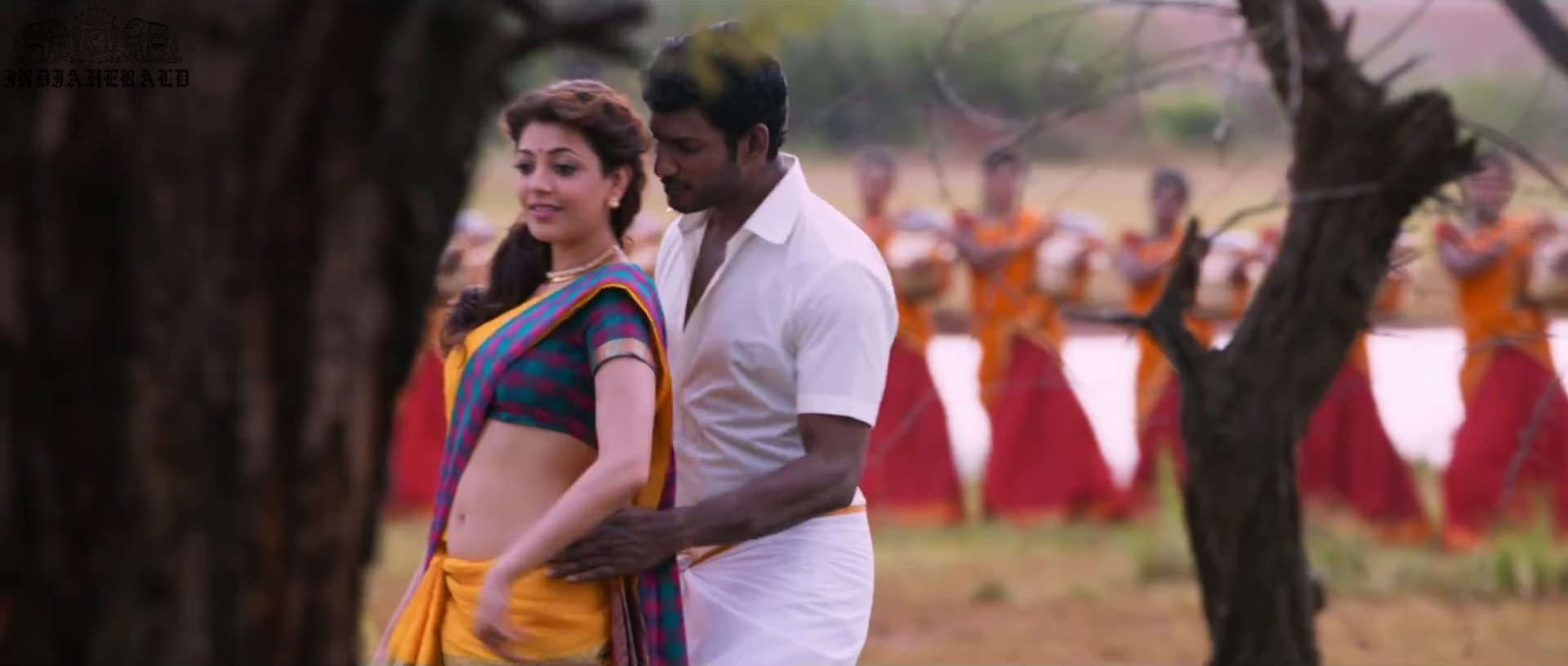 Kajal Aggarwal waist squeezed and Navel pressed by Hero Hot photos Set 1