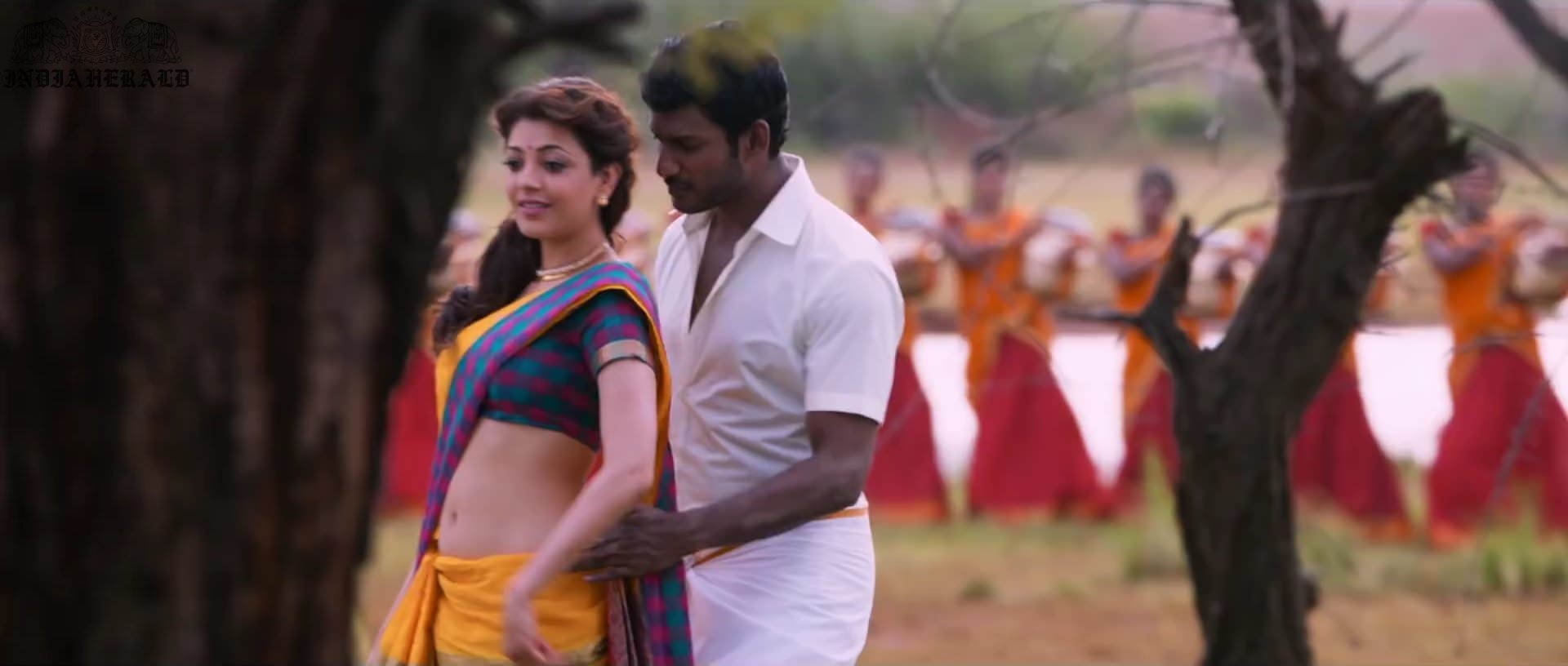 Kajal Aggarwal waist squeezed and Navel pressed by Hero Hot photos Set 1