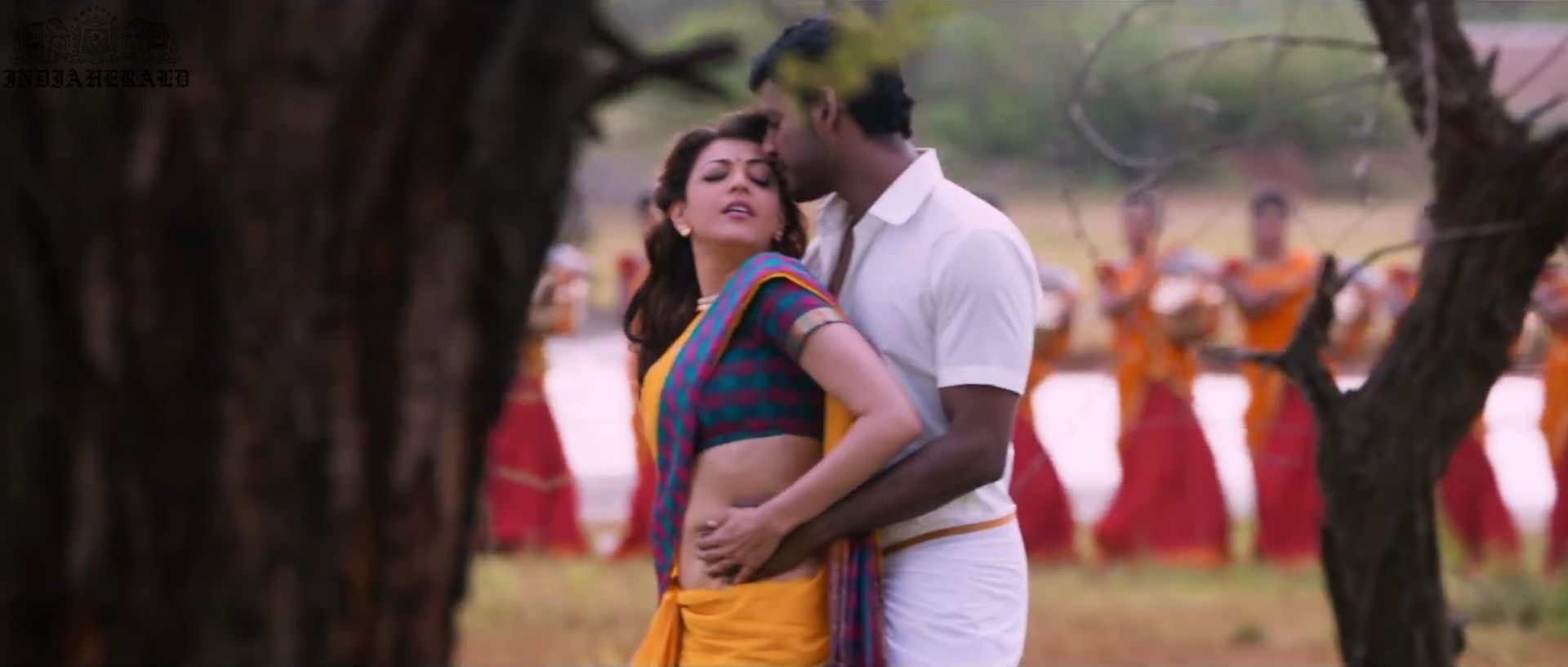 Kajal Aggarwal waist squeezed and Navel pressed by Hero Hot photos Set 1