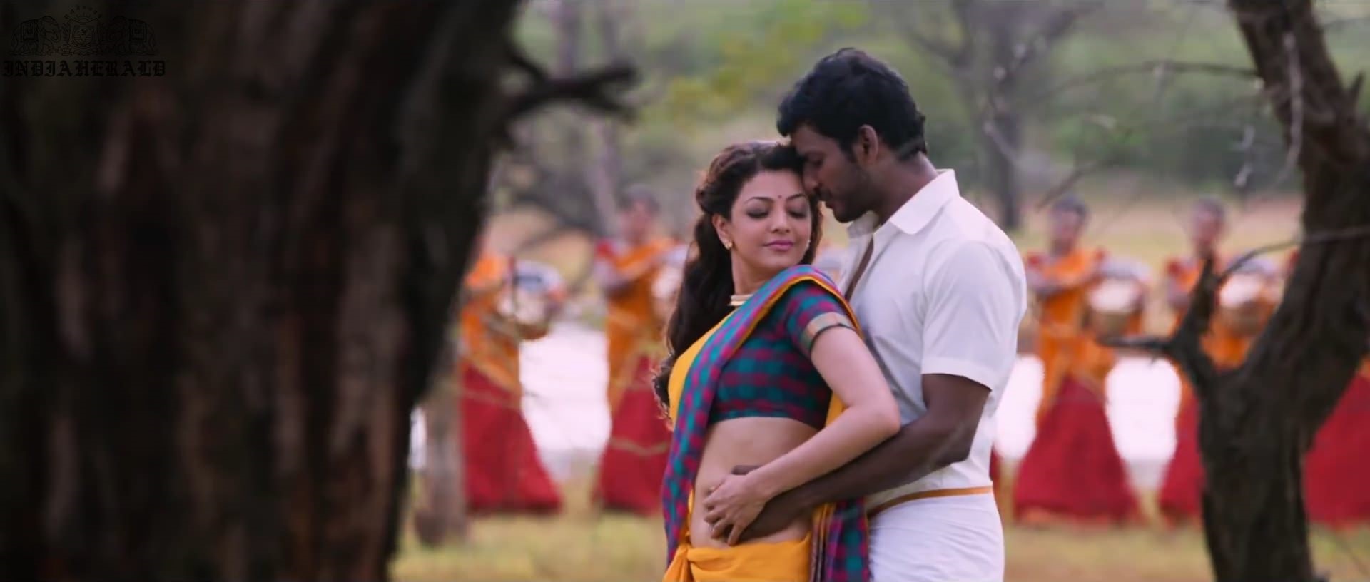 Kajal Aggarwal waist squeezed and Navel pressed by Hero Hot photos Set 2