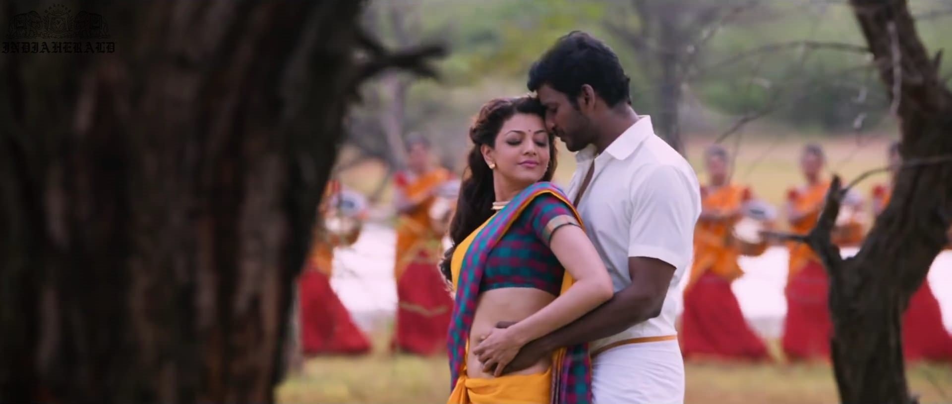 Kajal Aggarwal waist squeezed and Navel pressed by Hero Hot photos Set 2