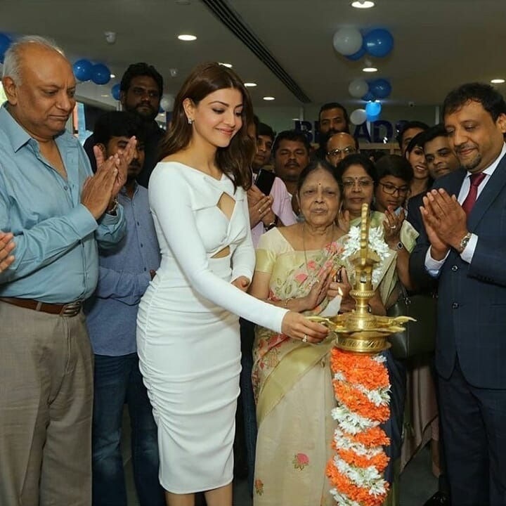 Kajal Aggerwal With Her Dad At The Opening Of Ratnadeep Showroom