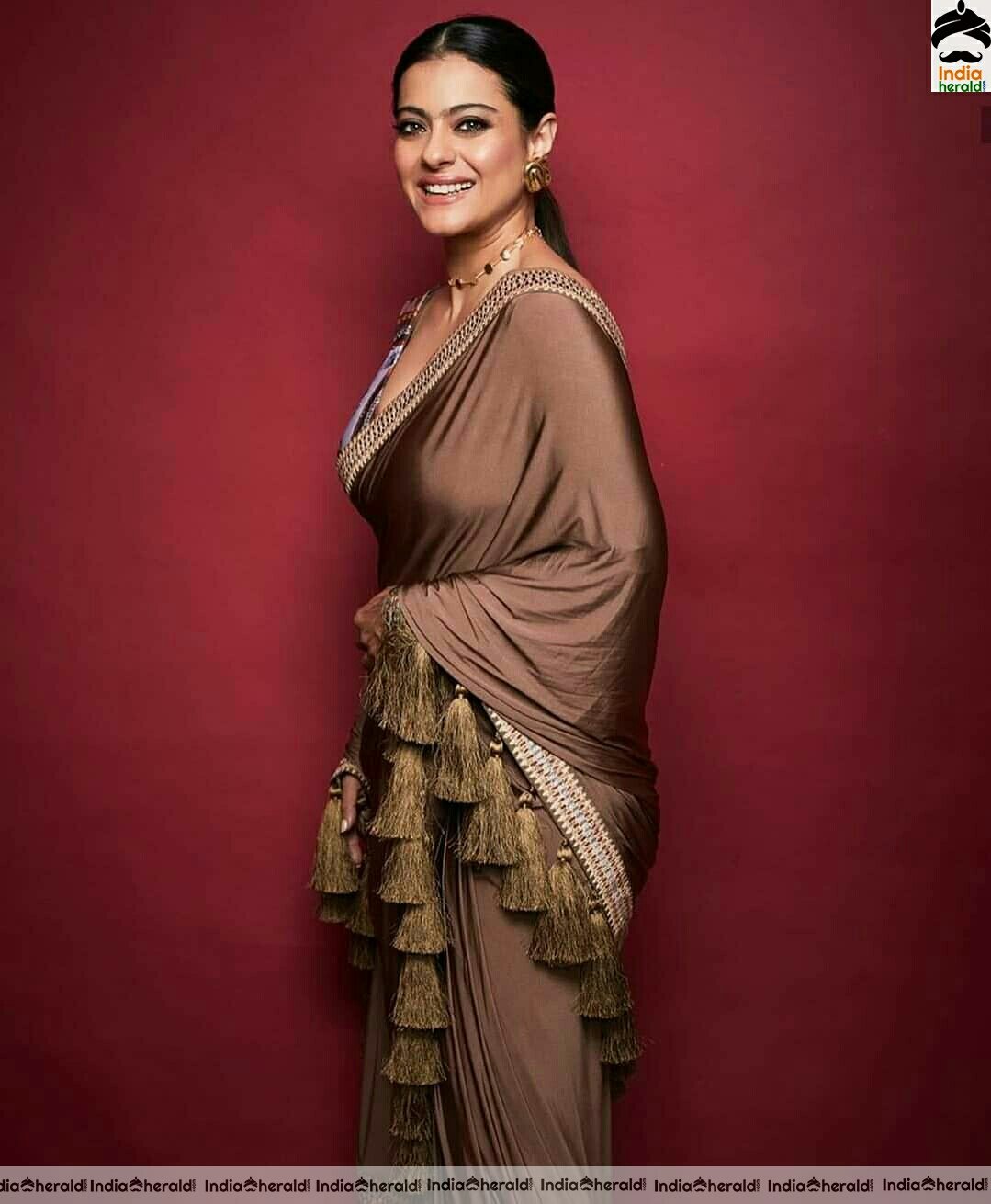 Kajol hot in brown Saree stills