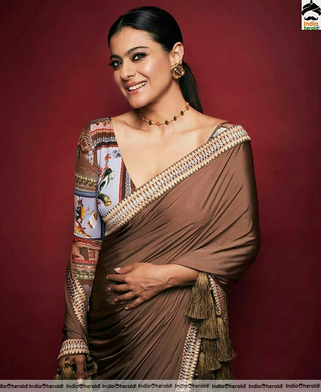 Kajol hot in brown Saree stills