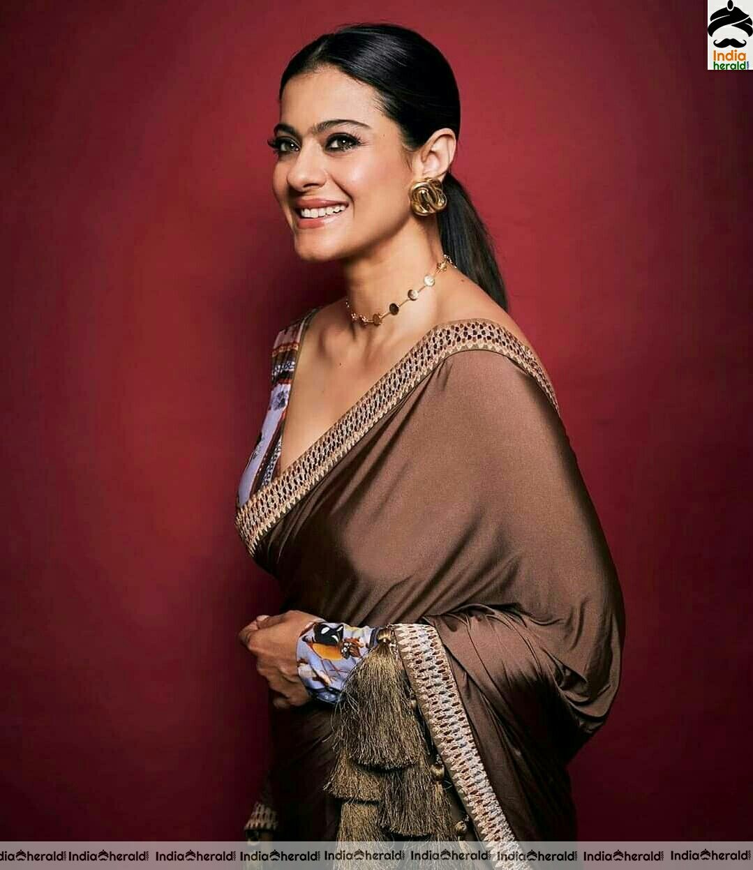 Kajol hot in brown Saree stills