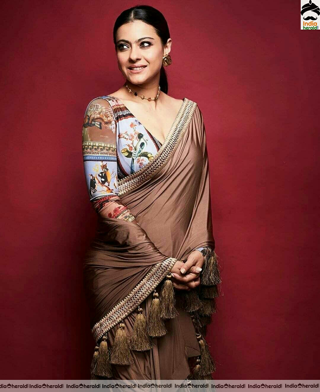 Kajol hot in brown Saree stills