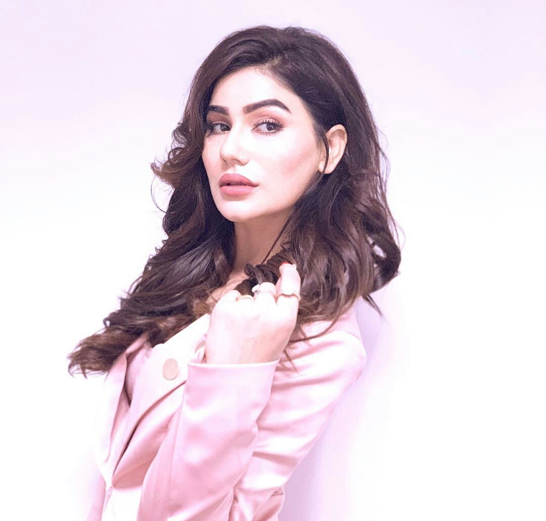 Kangna Sharma Showing Her Assets In A Formal Dress