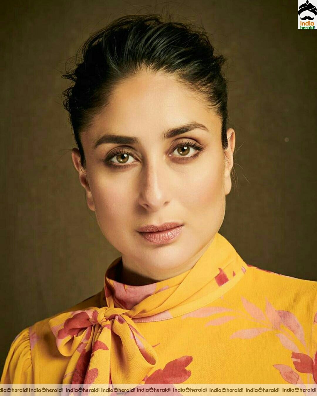 Kareena Kapoor looking pretty in yellow without ear ring