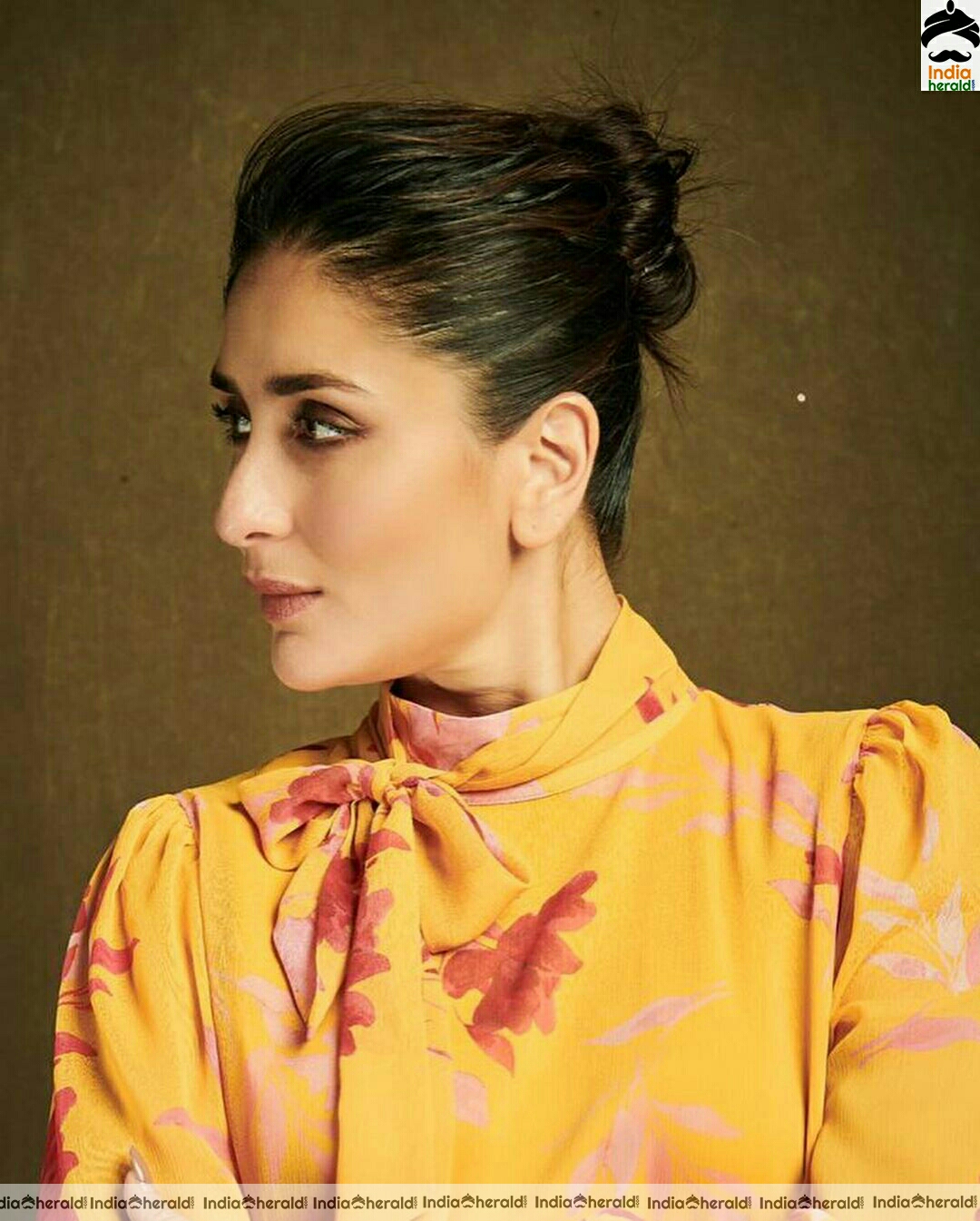 Kareena Kapoor looking pretty in yellow without ear ring