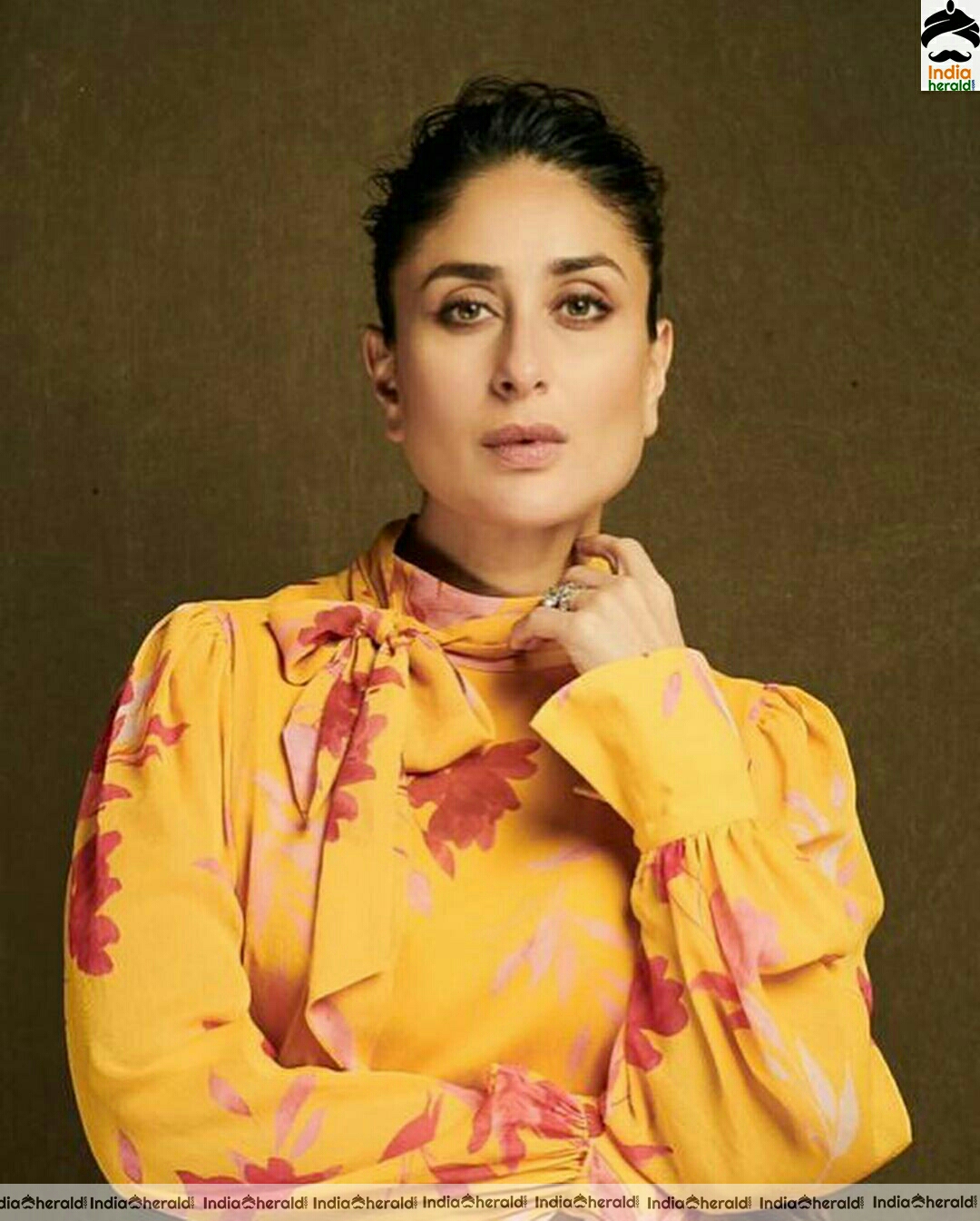 Kareena Kapoor looking pretty in yellow without ear ring