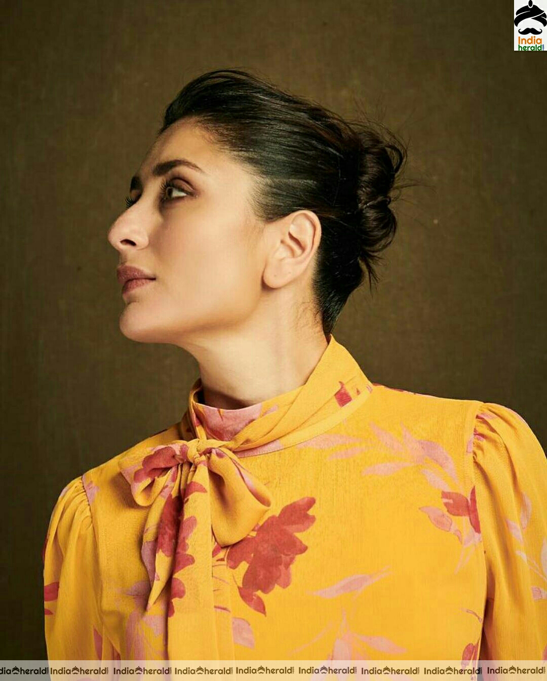 Kareena Kapoor looking pretty in yellow without ear ring