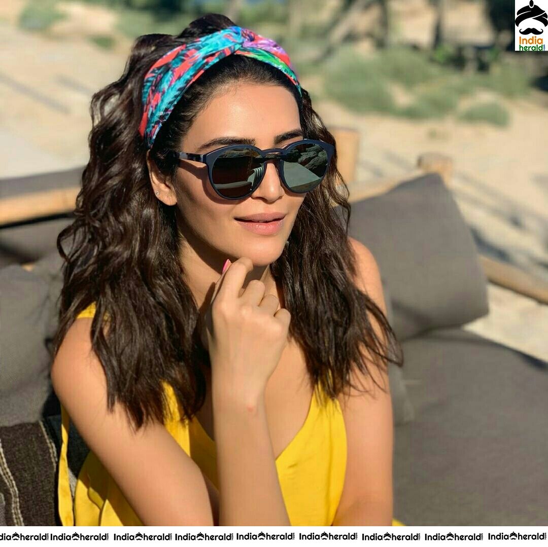 Karishma Tanna Graceful In Yellow Colour Short Dress