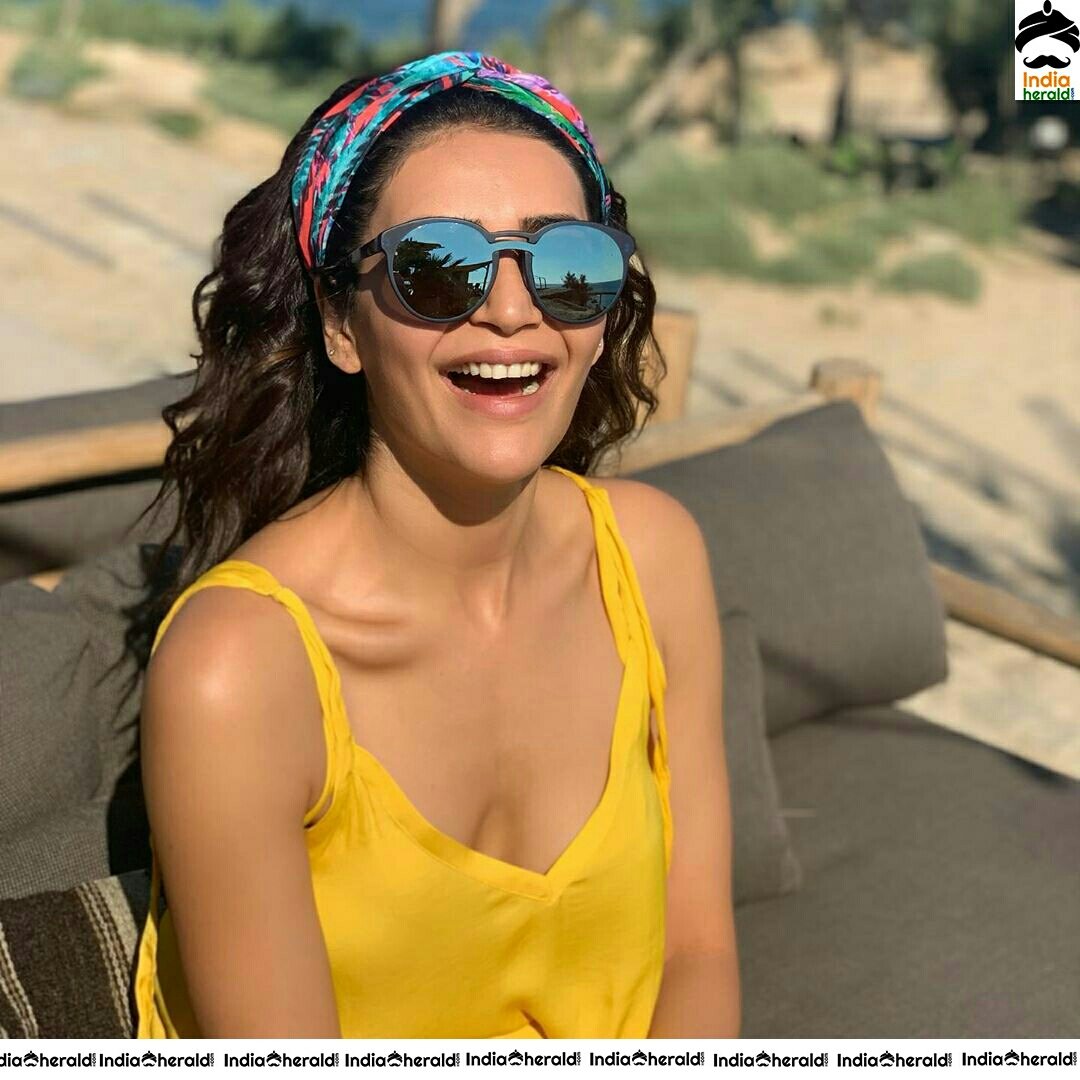 Karishma Tanna Graceful In Yellow Colour Short Dress