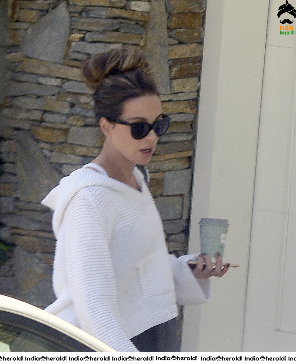 Kate Beckinsale in White Transparent Top and takes a walk at LA