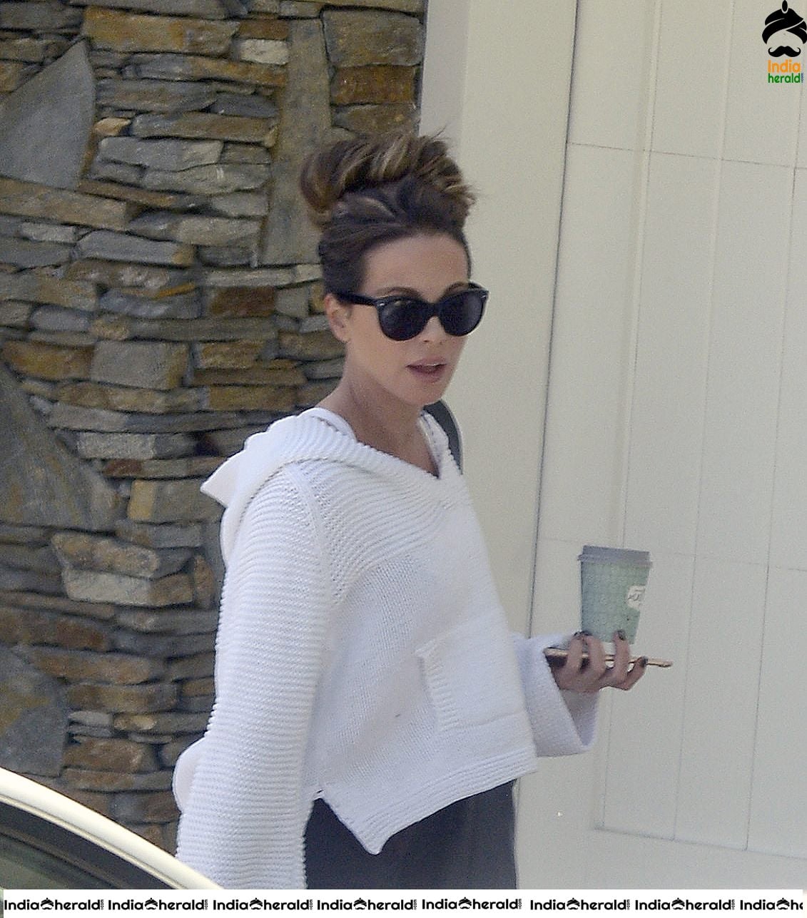 Kate Beckinsale in White Transparent Top and takes a walk at LA